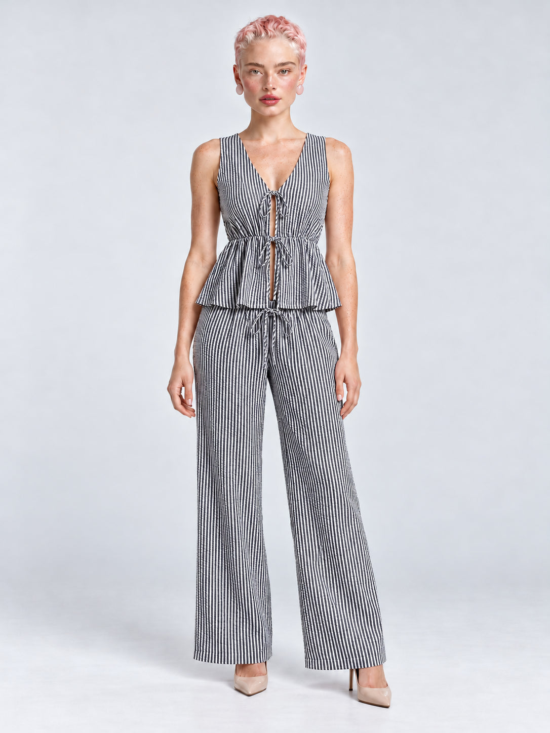 Conjunto Amalfi a rayas negro, conjunto de blusa y pantalón, vista frontal